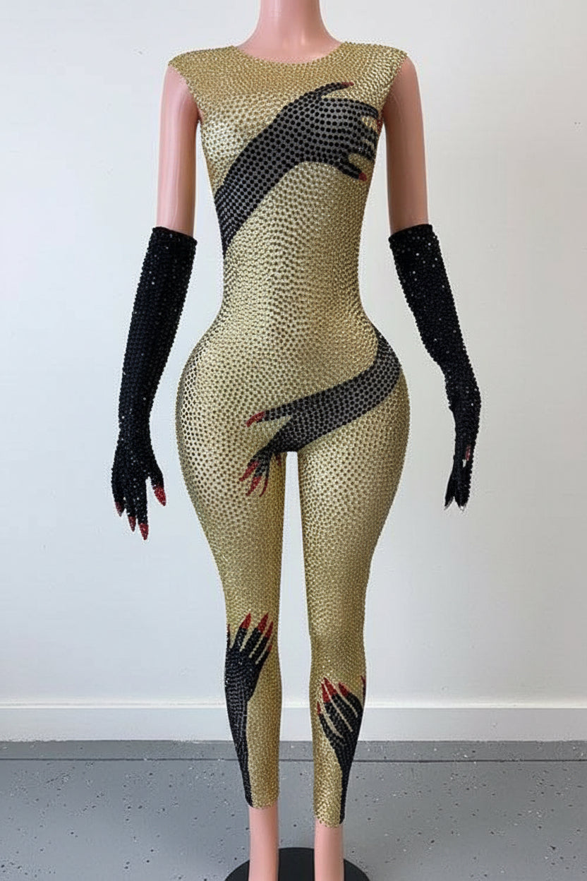 Yembi Fashion luxury gold rhinestone handprint jumpsuit featuring sparkly gold crystals and graphic black hands motif on a bodycon catsuit with matching long gloves