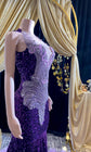 A glamorous embellished sequin dress with rhinestones, featuring a sparkling design perfect for evening wear and formal events