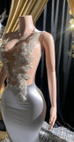 Yembi Fashion silver rhinestone mermaid gown with sheer nude illusion mesh bodice, silver crystal baroque embroidery, and fluid liquid satin train skirt