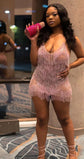 Yembi Fashion pink rhinestone fringe mini dress with V-neckline, sheer nude illusion mesh, and vertical hanging crystal tassel strands