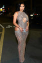 Yembi Fashion nude illusion crystal gown with central chest keyhole cutout, high neck, sheer beige mesh, and geometric vertical lines of silver rhinestones