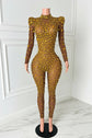 Yembi Fashion gold rhinestone jumpsuit with nude illusion mesh, high mock neck, and structured puff shoulders adorned with yellow crystals