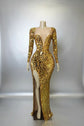 Yembi Fashion gold mirror maxi dress with plunging sweetheart neckline, geometric shattered glass mirror pieces, long sleeves, and high thigh slit