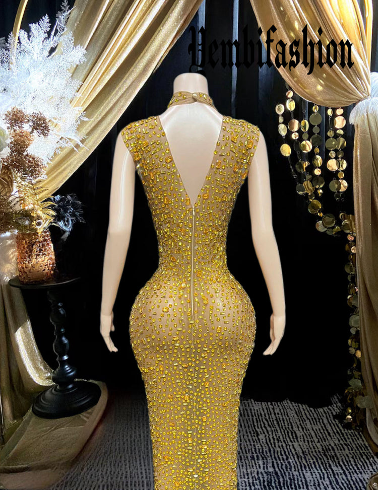 Yembi Fashion yellow crystal maxi dress with high mock neck, sleeveless sheer nude illusion mesh, and heavy constellation pattern of topaz rhinestones