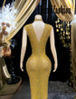 Yembi Fashion yellow crystal maxi dress with high mock neck, sleeveless sheer nude illusion mesh, and heavy constellation pattern of topaz rhinestones