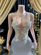 Yembi Fashion silver rhinestone mermaid gown with sheer nude illusion mesh bodice, silver crystal baroque embroidery, and fluid liquid satin train skirt