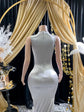 Yembi Fashion silver rhinestone mermaid gown with sheer nude illusion mesh bodice, silver crystal baroque embroidery, and fluid liquid satin train skirt