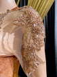 Yembi Fashion brown velvet mermaid gown with high neck, long sheer mesh sleeves, heavy bronze crystal baroque embroidery, and rich chocolate velour train