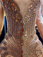 Yembi Fashion brown velvet mermaid gown with high neck, long sheer mesh sleeves, heavy bronze crystal baroque embroidery, and rich chocolate velour train