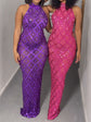 A long pink prom dress with delicate embellishments, perfect for formal occasions.