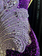 A glamorous embellished sequin dress with rhinestones, featuring a sparkling design perfect for evening wear and formal events