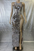 Yembi Fashion silver mirror maxi dress with round neckline, geometric shattered glass mirror pieces, sleeveless nude illusion mesh, and extreme high thigh slit