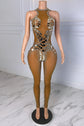 Yembi Fashion luxury silver mirror jumpsuit featuring an architectural pattern of reflective silver mirror shards and scattered crystals on a nude illusion halter neck catsuit