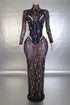 Yembi Fashion multicolor crystal maxi dress with sheer black mesh, built-in bodysuit lining, and vertical hanging rainbow rhinestone fringe