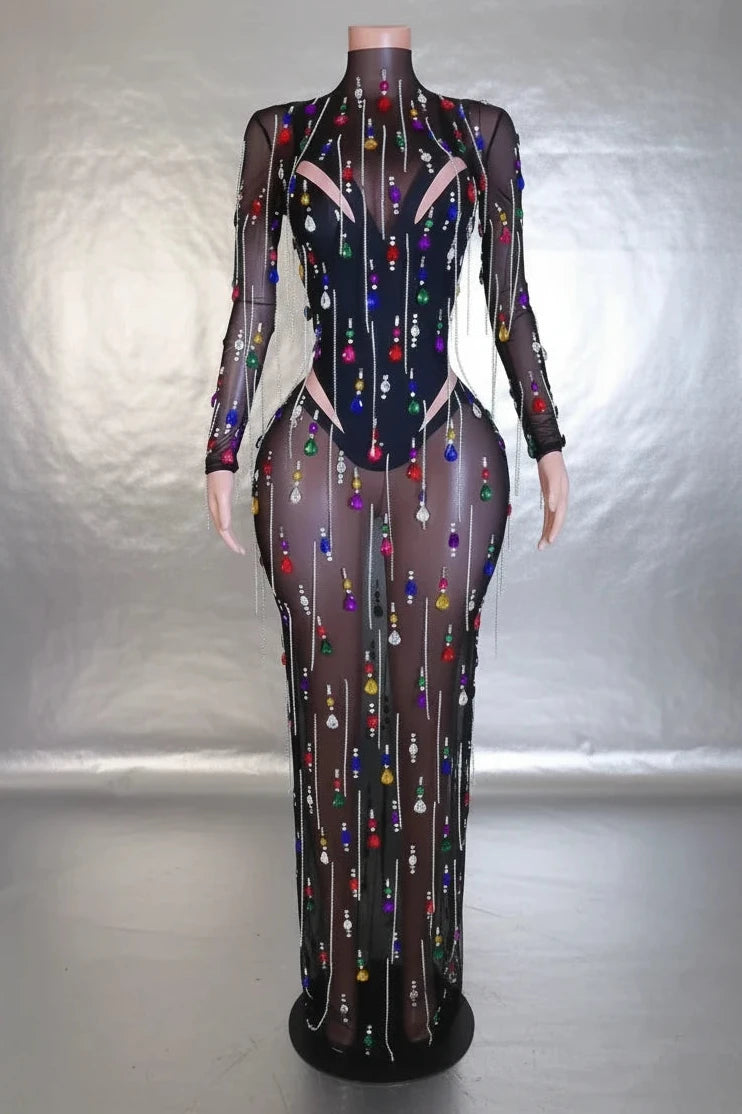 Yembi Fashion multicolor crystal maxi dress with sheer black mesh, built-in bodysuit lining, and vertical hanging rainbow rhinestone fringe