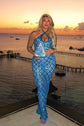 Yembi Fashion blue crystal halter dress with criss-cross neckline, central chest keyhole cutout, sheer blue mesh, and geometric diamond grid pattern of sapphire rhinestones