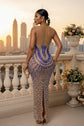 Yembi Fashion royal blue crystal maxi dress with sheer nude illusion mesh, vertical sapphire rhinestone lines, and baroque crystal bodice embellishments