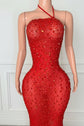 Yembi Fashion red crystal maxi dress with asymmetric halter neck strap, sheer red mesh, and heavy constellation pattern of ruby red rhinestones