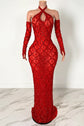 Yembi Fashion red crystal halter dress with criss-cross neckline, central chest keyhole cutout, sheer red mesh, and geometric diamond grid pattern of ruby rhinestones