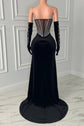 Yembi Fashion black velvet maxi dress with strapless sheer mesh corset bodice, vertical silver rhinestone lines, draped chest body chains, and matching embellished velvet gloves
