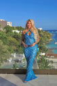 Yembi Fashion blue crystal halter dress with criss-cross neckline, central chest keyhole cutout, sheer blue mesh, and geometric diamond grid pattern of sapphire rhinestones