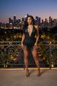 Yembi Fashion black crystal fringe playsuit with plunging V-neckline halter top, heavy jet-black rhinestone embellishments, and hanging crystal bead tassels