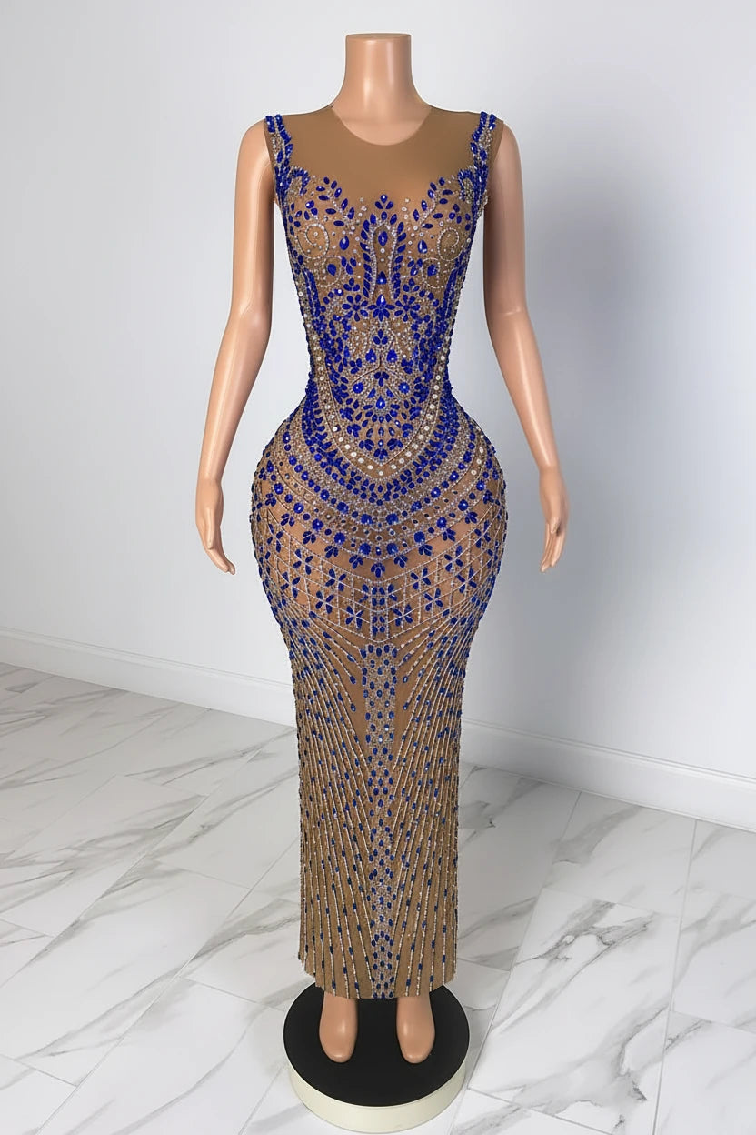 Yembi Fashion royal blue crystal maxi dress with sheer nude illusion mesh, vertical sapphire rhinestone lines, and baroque crystal bodice embellishments