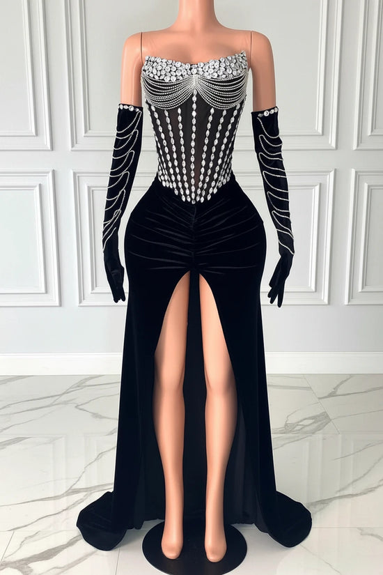 Yembi Fashion black velvet maxi dress with strapless sheer mesh corset bodice, vertical silver rhinestone lines, draped chest body chains, and matching embellished velvet gloves