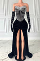 Yembi Fashion black velvet maxi dress with strapless sheer mesh corset bodice, vertical silver rhinestone lines, draped chest body chains, and matching embellished velvet gloves