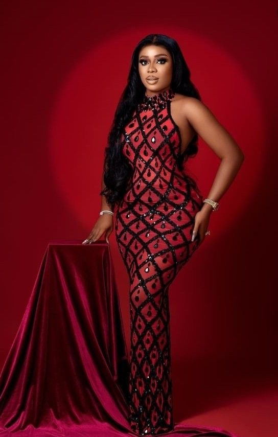 Yembi Fashion red crystal halter dress with sheer mesh, geometric diamond grid pattern, and black rhinestone teardrops