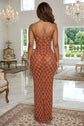 Yembi Fashion burnt orange crystal maxi dress with strapless neckline, sheer nude illusion mesh waist cutouts, silver rhinestones, and high thigh slit